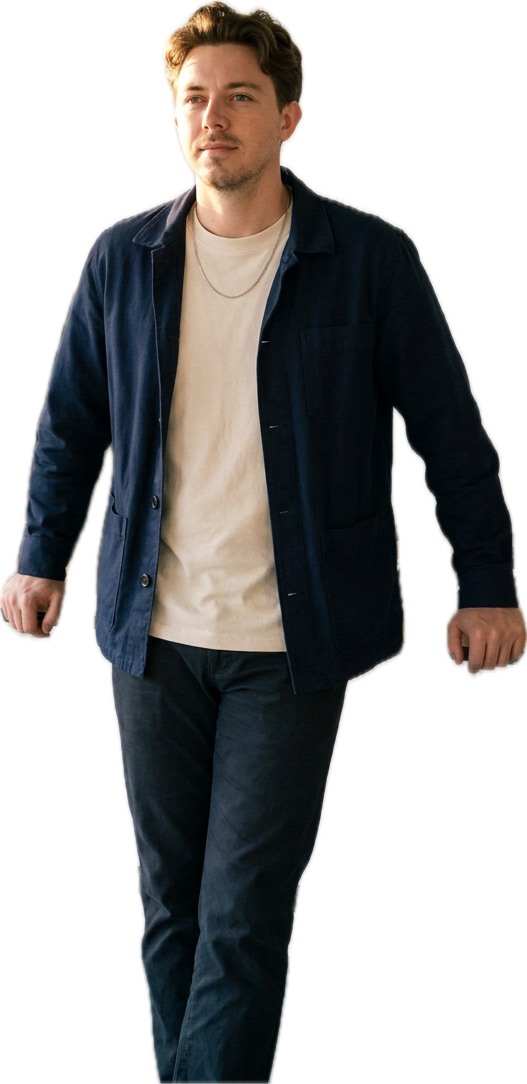 Nassi Mandalas standing in a navy jacket
